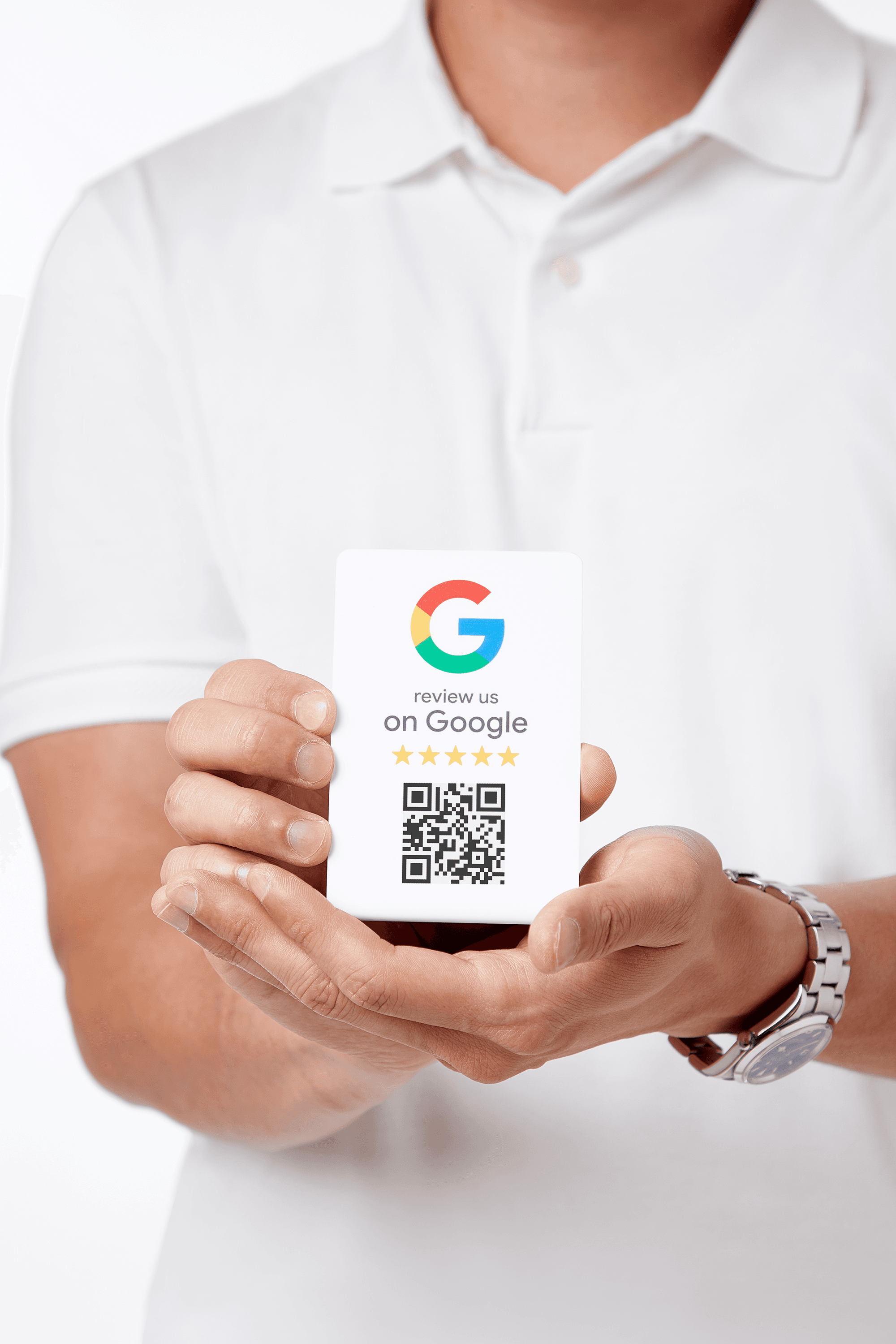 Customer tapping a phone on the Google Review Stand to leave a review