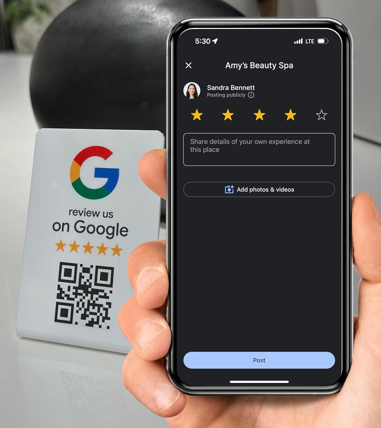 Customer scanning the Google Review Stand QR code to leave a Google review
