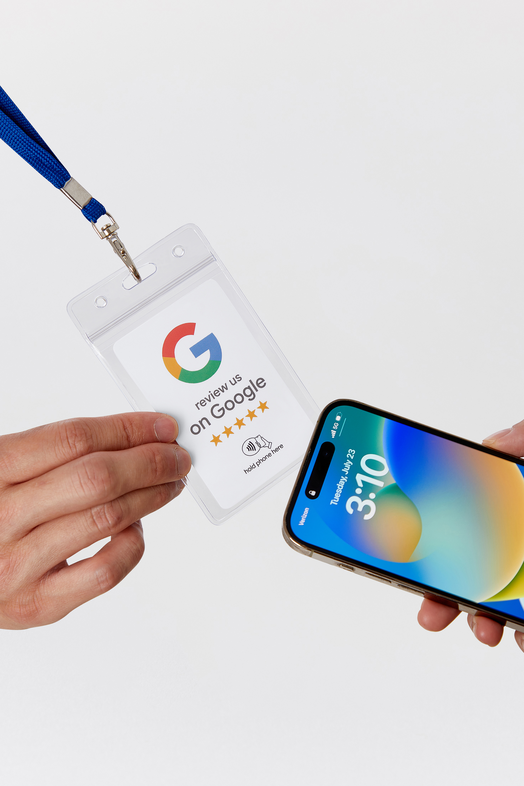 A customer tapping their phone on a ProsperQR review card